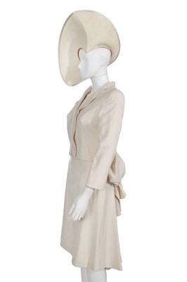 Lot 64 - An Alexander McQueen ivory skirt suit and hat, commercial collection, 2006