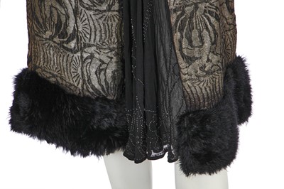 Lot 371 - A black and silver lamé flapper dress, circa 1925