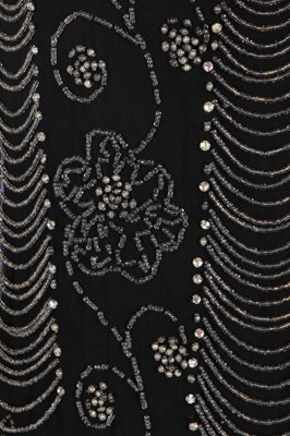 Lot 372 - A beaded black chiffon flapper dress, circa 1925