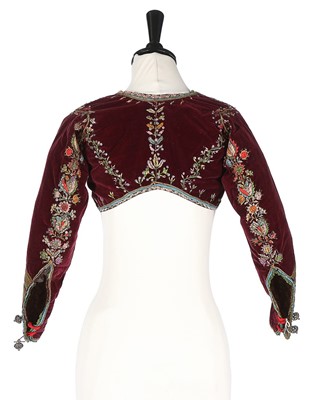 Lot 427 - An embroidered purple velvet bolero jacket,...