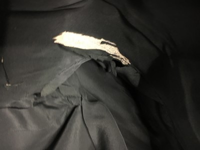 Lot 391 - A Christian Dior haute couture black wool day suit, probably Autumn-Winter 1949-50