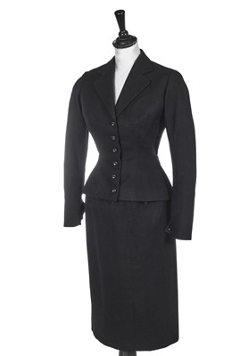 Lot 391 - A Christian Dior haute couture black wool day suit, probably Autumn-Winter 1949-50