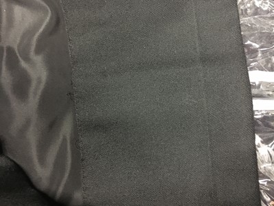 Lot 391 - A Christian Dior haute couture black wool day suit, probably Autumn-Winter 1949-50