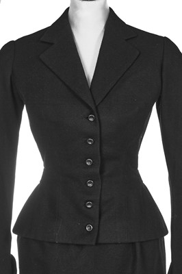 Lot 391 - A Christian Dior haute couture black wool day suit, probably Autumn-Winter 1949-50