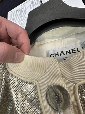 Lot 24 - A Chanel perforated metallic lambskin leather jacket, probably 'Paris-Cosmopolite' collection, Métiers d'Art, Pre-Fall 2017