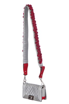 Lot 43 - A Chanel small silver Boy bag with flower strap,  'Paris-Bombay' collection, Métiers d'Art, Pre-Fall 2012