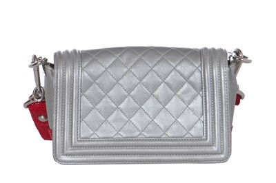 Lot 43 - A Chanel small silver Boy bag with flower strap,  'Paris-Bombay' collection, Métiers d'Art, Pre-Fall 2012