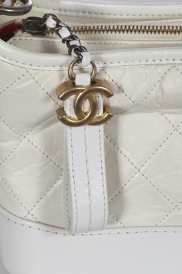 Lot 44 - A Chanel small white leather Gabrielle hobo bag, circa 2017