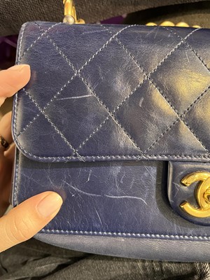 Lot 45 - A Chanel quilted navy leather flap bag, 2017-2018