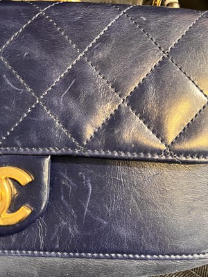 Lot 45 - A Chanel quilted navy leather flap bag, 2017-2018