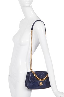 Lot 45 - A Chanel quilted navy leather flap bag, 2017-2018