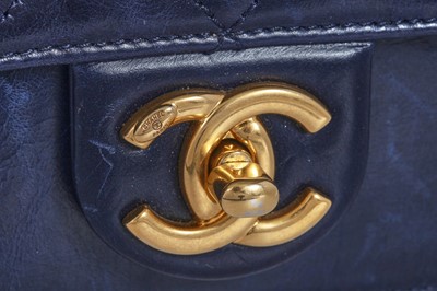 Lot 45 - A Chanel quilted navy leather flap bag, 2017-2018
