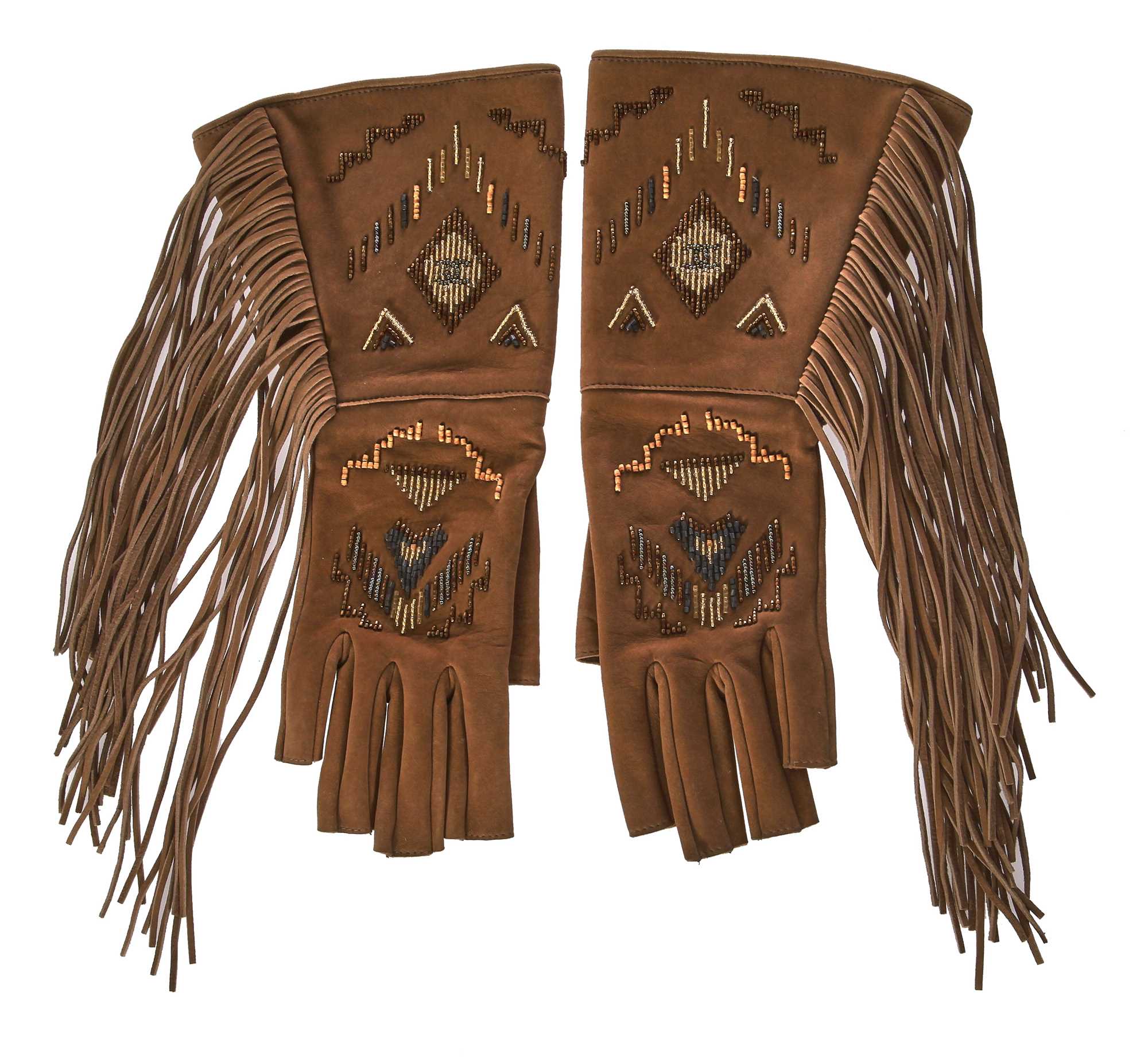 Lot 46 - A pair of Chanel fringed suede gloves, 'Paris-Dallas' collection, Métiers d'Art, Pre-Fall 2014