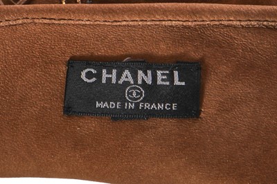 Lot 46 - A pair of Chanel fringed suede gloves, 'Paris-Dallas' collection, Métiers d'Art, Pre-Fall 2014