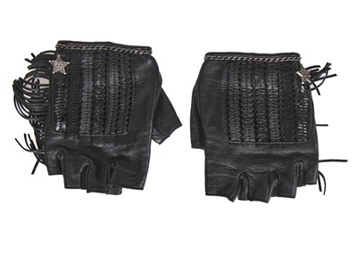 Lot 48 - A pair of Chanel fringed leather motoring gloves, 'Paris-Dallas' collection, Métiers d'Art, Pre-Fall 2014