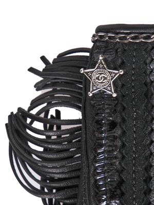 Lot 48 - A pair of Chanel fringed leather motoring gloves, 'Paris-Dallas' collection, Métiers d'Art, Pre-Fall 2014