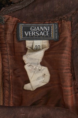 Lot 189 - A fine Gianni Versace brown Oroton dress, Autumn-Winter 1996-97