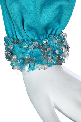 Lot 385 - A Loris Azzaro blue stretch jersey dress, 1970s