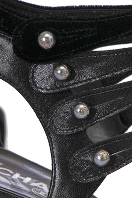 Lot 37 - Two pairs of black Chanel shoes, 2000s