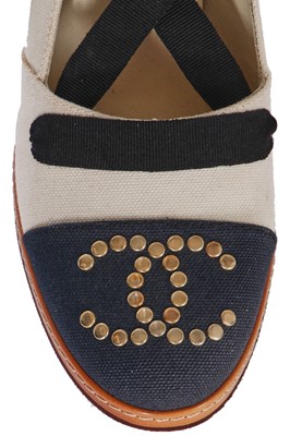 Lot 17 - A pair of Chanel ivory and black canvas wedges, 2010s