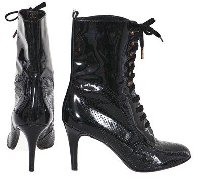 Lot 26 - A pair of Chanel black patent leather boots, 2010s
