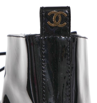 Lot 26 - A pair of Chanel black patent leather boots, 2010s