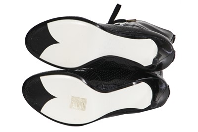 Lot 26 - A pair of Chanel black patent leather boots, 2010s