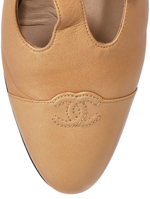 Lot 44 - A pair of Chanel tan leather T-bar Mary-Jane ballet flats, 2000s