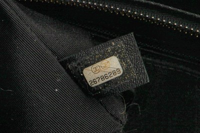 Lot 2 - A Chanel black and gold medium Gabrielle hobo bag, circa 2019