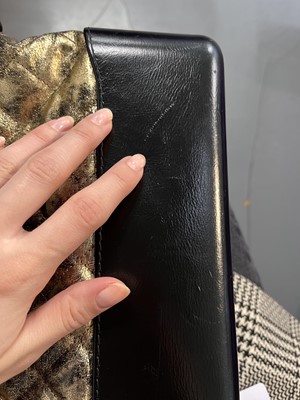 Lot 2 - A Chanel black and gold medium Gabrielle hobo bag, circa 2019