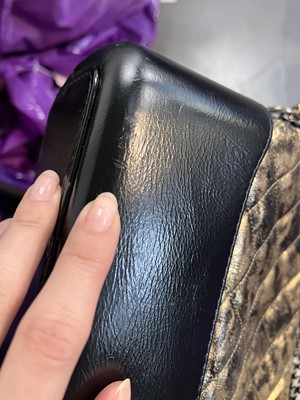 Lot 2 - A Chanel black and gold medium Gabrielle hobo bag, circa 2019