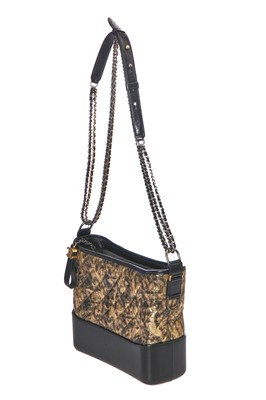 Lot 2 - A Chanel black and gold medium Gabrielle hobo bag, circa 2019