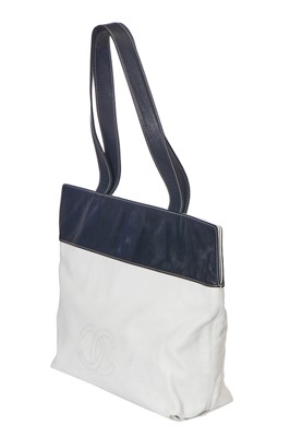 Lot 5 - A Chanel white and navy blue leather shopper tote, 1997-99