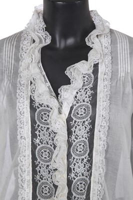 Lot 10 - A Chanel white cotton and lace blouse, Autumn-Winter 2004-05