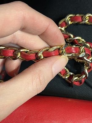 Lot 8 - A Chanel red lambskin trapezoid flap bag, circa 1985