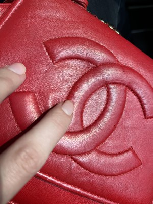 Lot 8 - A Chanel red lambskin trapezoid flap bag, circa 1985