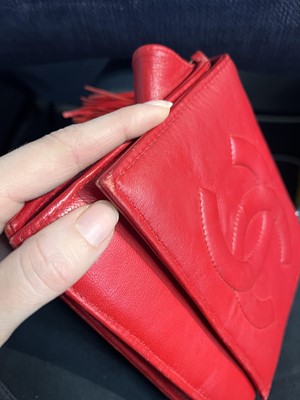 Lot 8 - A Chanel red lambskin trapezoid flap bag, circa 1985