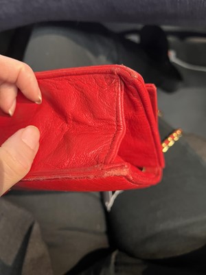 Lot 8 - A Chanel red lambskin trapezoid flap bag, circa 1985