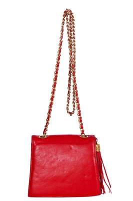 Lot 8 - A Chanel red lambskin trapezoid flap bag, circa 1985