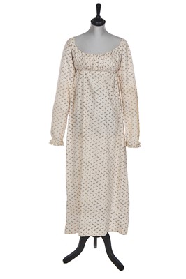 Lot 509 - A printed cotton day dress, circa 1810