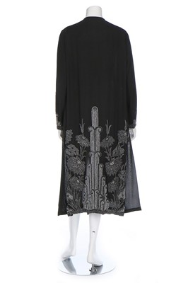 Lot 62 - A beaded chiffon evening coat, 1920s, with...