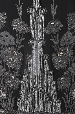 Lot 62 - A beaded chiffon evening coat, 1920s, with...