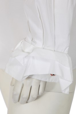 Lot 15 - Two white cotton Chanel blouses, modern