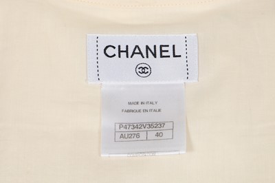 Lot 15 - Two white cotton Chanel blouses, modern