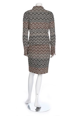 Lot 66 - A Chanel silk and wool suit, 2005, labelled,...