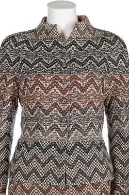 Lot 66 - A Chanel silk and wool suit, 2005, labelled,...