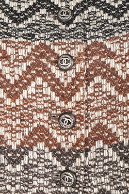 Lot 66 - A Chanel silk and wool suit, 2005, labelled,...