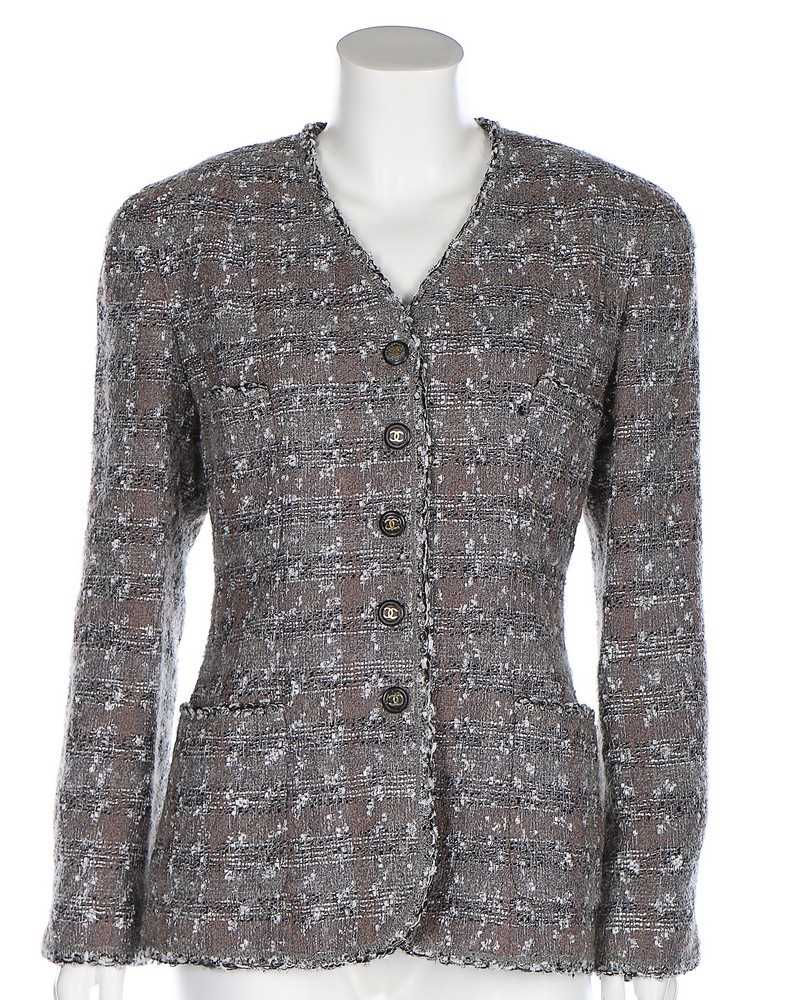 Lot 68 - A Chanel grey and silver tweed jacket, 1994,...
