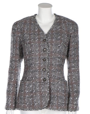 Lot 68 - A Chanel grey and silver tweed jacket, 1994,...