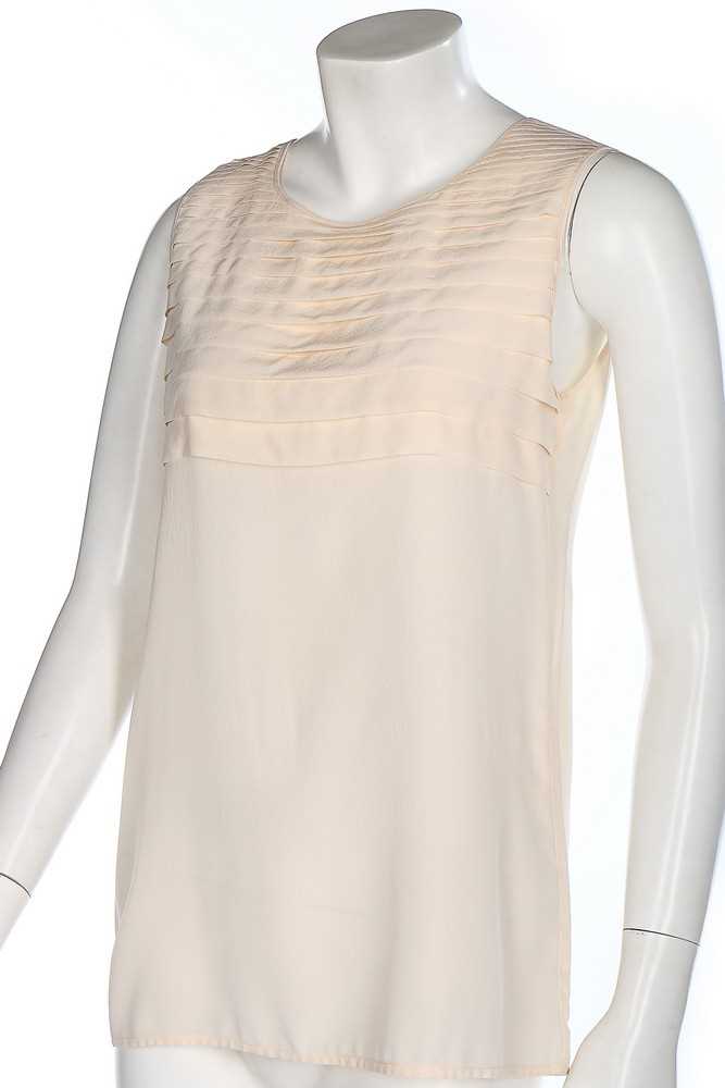 Lot 7 - Three Chanel cream silk bodices, 1990s,...